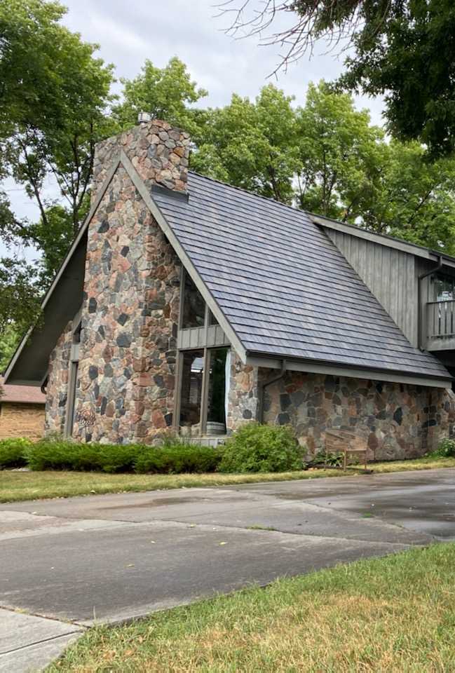 Roofing Service - Steep Roof on Home